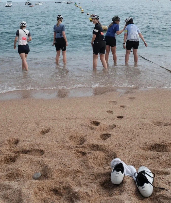 Cycling camp group at the beach